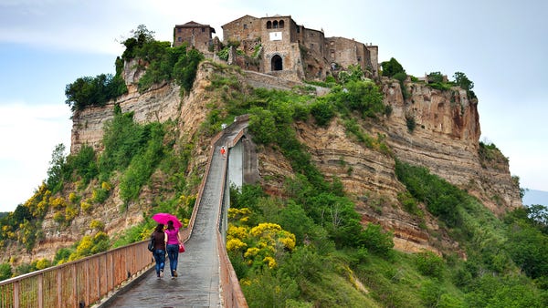 A footpath is all that connects Italy's Civita di...