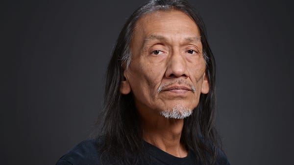 Native American advocate Nathan Phillips, of...