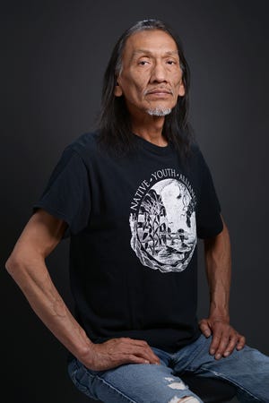 Native American advocate Nathan Phillips, of Ypsilanti, Mich., sits for a portrait in Ypsilanti on May 2, 2015. Phillips gained national attention following a standoff between Phillips and a group of Catholic high school students went viral on Friday, January 18, 2022 in Washington, D.C.