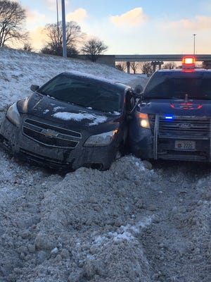 A Michigan State Police SUV was hit by a 2013 Chevy Malibu on southbound I-75 near the Davison Freeway on Jan. 20, 2019.
