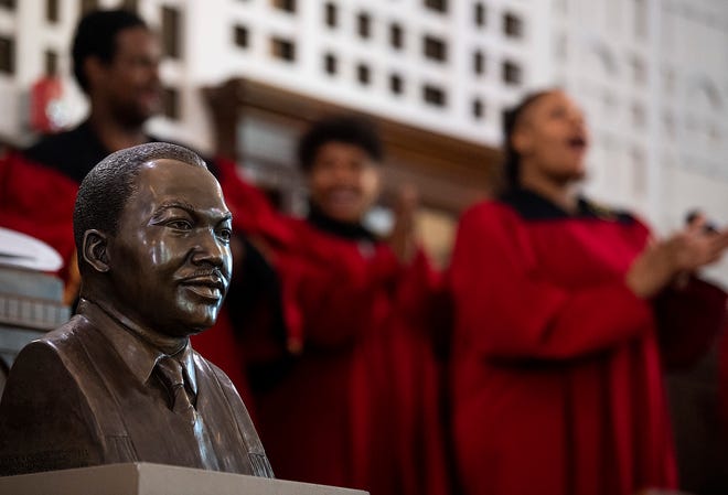 The Martin Luther King, Jr., bust is unveiled at Dexter Avenue King Memorial Baptist Church in Montgomery, Ala., on Monday January 21, 2019. 