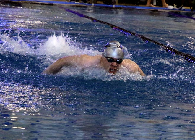Carlsbad's Jared Rea swims the 100 yd butterfly during Saturday's meet.