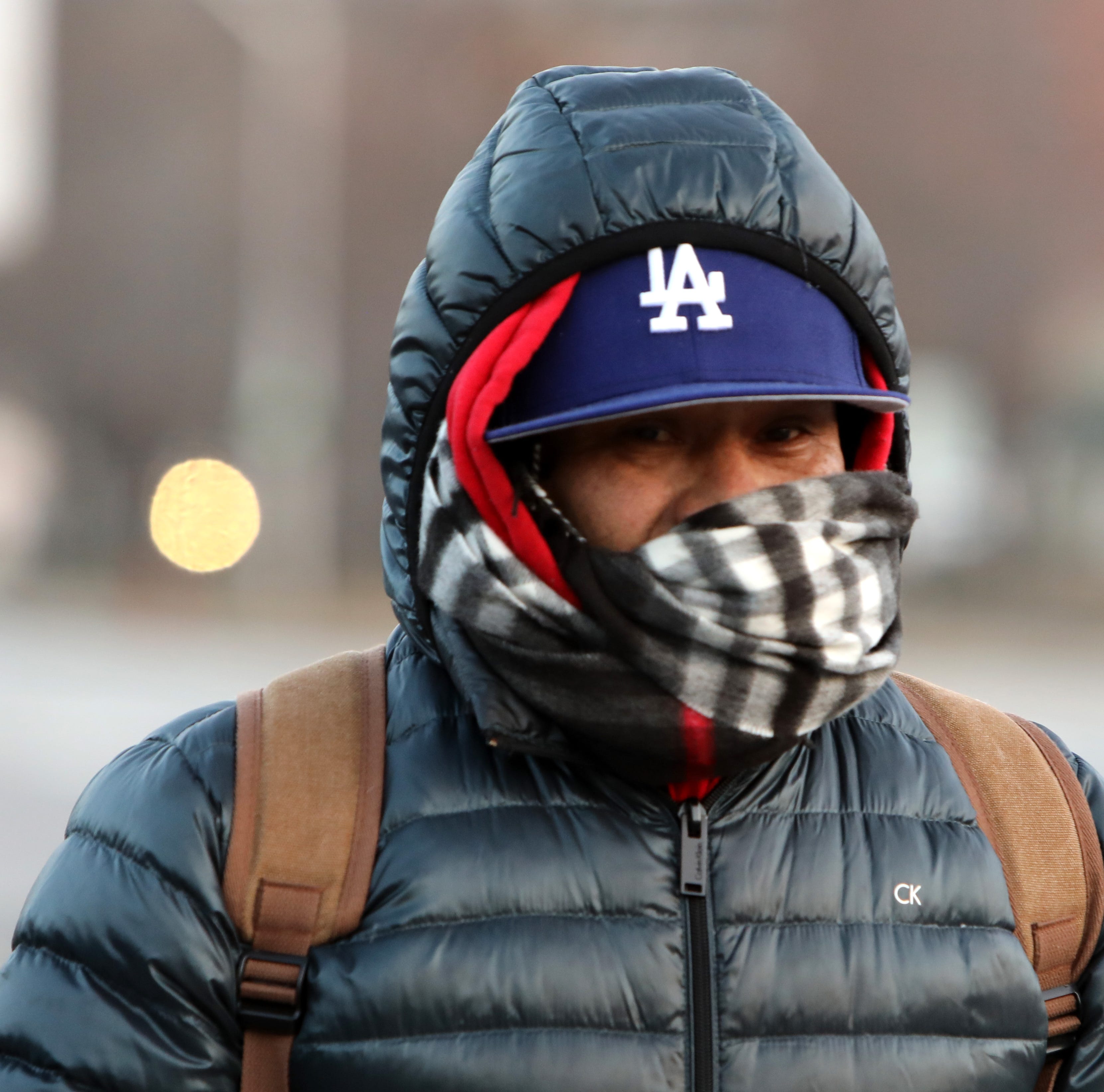 Jorge Cacares of Sleepy Hollow is all bundled up as he walks to the Tarrytown train station in freezing temperatures Jan. 21, 2019. 