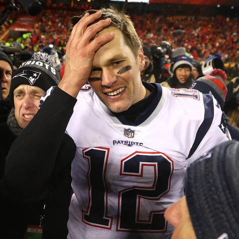 New England Patriots quarterback Tom Brady (12)...