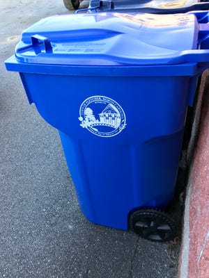 A reader asks if the city of Asheville's recycling carts are not as sturdy as the older trash cans.