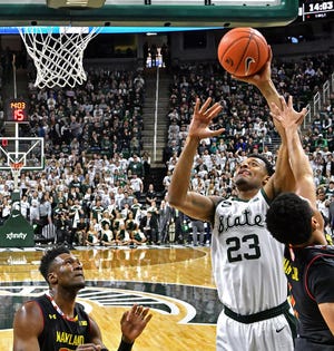 Michigan State's Xavier Tillman banks a shot off the glass for two of his 10 points in the Spartans' 69-55 victory over the Maryland Terrapins Monday at the Breslin Center.