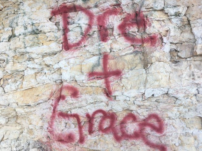 Local climbers discovered graffiti on the rocks at Torture Chamber bouldering area near Horsetooth Reservoir.
