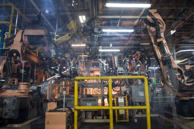 Robotic arms assemble vehicles in the weld shop at the Hyundai Motor Manufacturing Alabama plant in Montgomery on Jan. 18, 2019. The vehicle manufacture on Friday provided a $78,800 grant to expand robotics programs at Montgomery Public Schools.