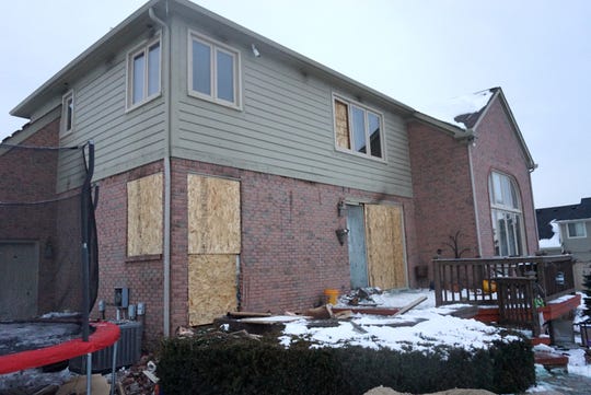 With many of its windows covered now in particle board, this home in the 16000 block of Forest Drive in Northville Township sustained significant damage in a recent fire.