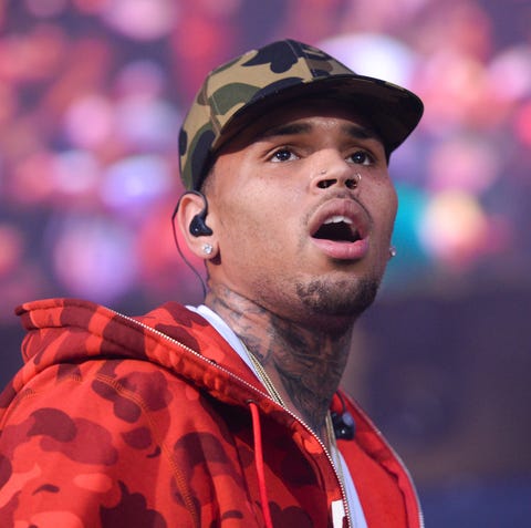 Artist Chris Brown, performing in 2015, and two...