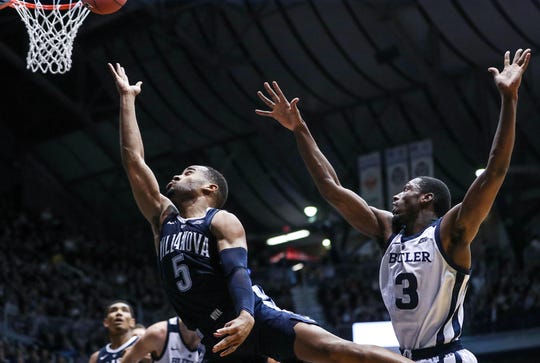 Butler Bulldogs guard Kamar Baldwin (3) is unable to stop a shot by Villanova Wildcats guard Phil Booth (5) during the second half of the game at Hinkle Fieldhouse in Indianapolis, Tuesday, Jan. 22, 2019. Butler lost, 72-80.