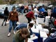 Hundreds of volunteers and recipients Saturday, Jan. 19, 2019 at Help for Hampton Roads Coast Guard Families food drive, sponsored by the Chief Petty Officer Association, in Chesapeake for families affected by the shutdown. (Stephen M. Katz/The Virginian-Pilot via AP) ORG XMIT: VANOV105