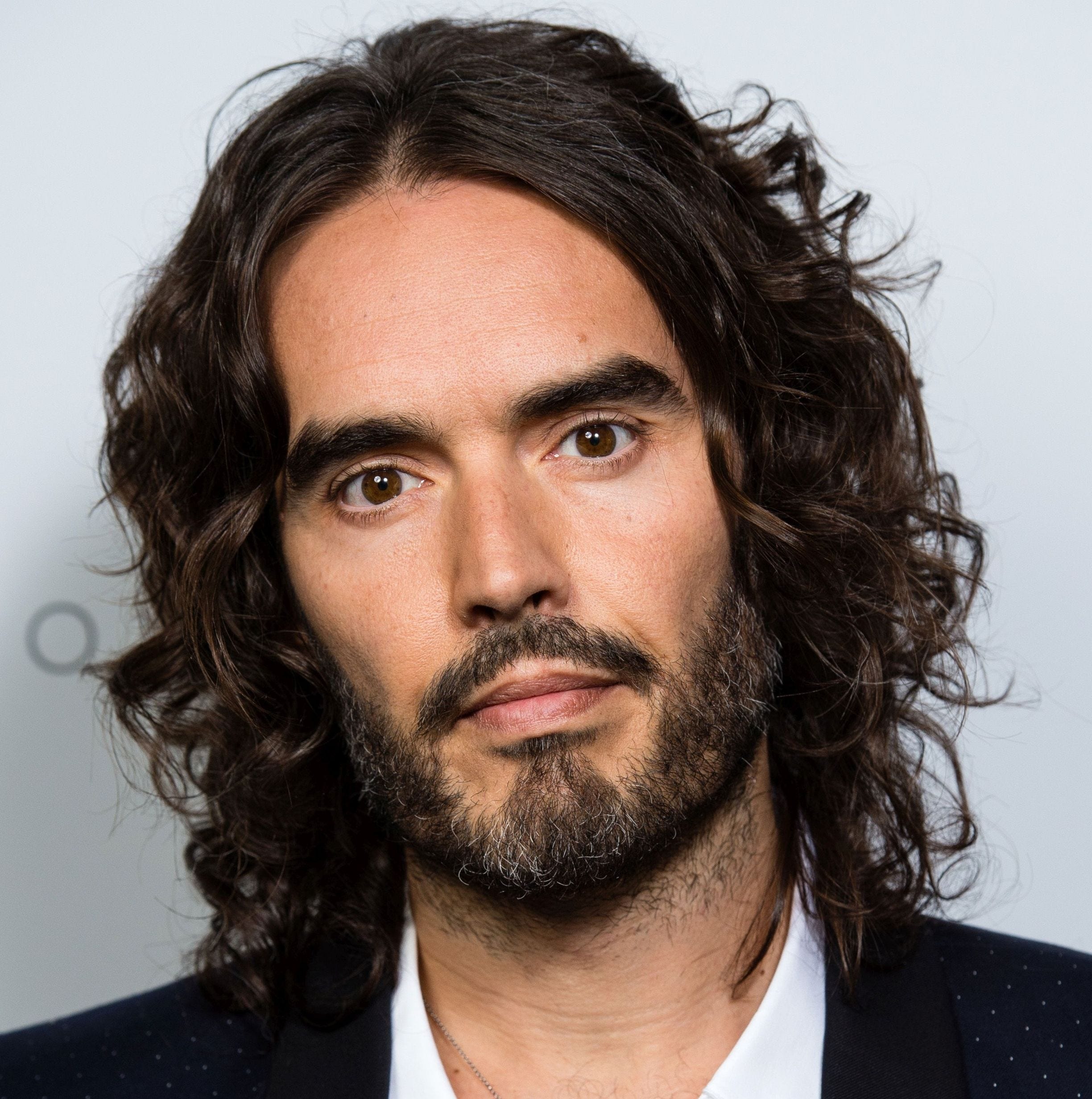 Russell Brand reveals 'inept' parenting, faces backlash