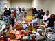 Hundreds of volunteers and recipients Saturday, Jan. 19, 2019 at Help for Hampton Roads Coast Guard Families food drive, sponsored by the Chief Petty Officer Association, in Chesapeake for families affected by the shutdown. (Stephen M. Katz/The Virginian-Pilot via AP) ORG XMIT: VANOV102