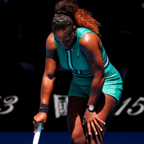 Serena Williams reacts during her match against...
