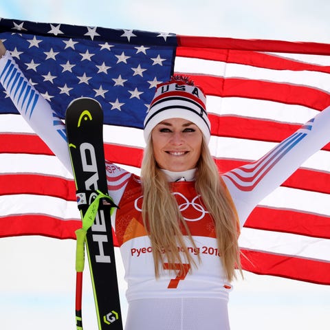 Lindsey Vonn (USA) celebrates winning the bronze...