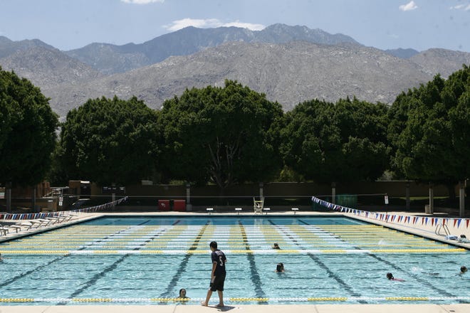 This Desert Sun file photo shows the Palm Springs Swim Center. A unisex shower is among improvements on tap.