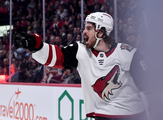 Jan 23, 2019; Montreal, Quebec, CAN; Arizona Coyotes forward Conor Garland (83) reacts after scoring a goal against the Montreal Canadiens during the second period at the Bell Centre. Mandatory Credit: Eric Bolte-USA TODAY Sports