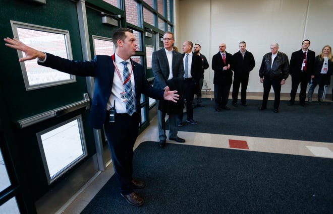 Nixa High School Principal Mark McGehee shows administrators and school board members the proposed location for a new performing arts center at the school on Thursday, Jan. 24, 2019.