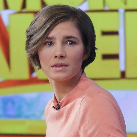 Amanda Knox prepares to leave the set following a...