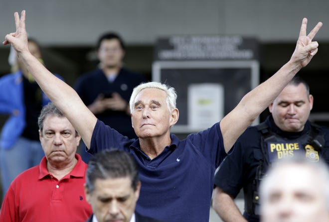 Former campaign adviser for President Donald Trump,  Roger Stone walks out of the federal courthouse following a hearing, Friday, Jan. 25, 2019, in Fort Lauderdale, Fla.  Stone was arrested Friday in the special counsel's Russia investigation and was charged with lying to Congress and obstructing the probe. (AP Photo/Lynne Sladky)