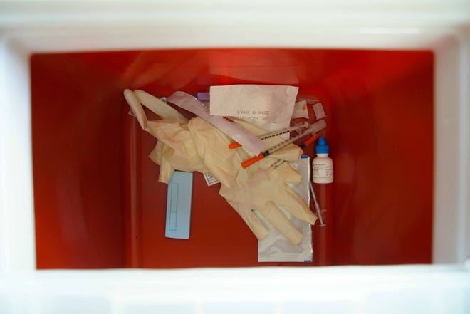 Old needle rest in a box for safe deposal on Brandywine Counseling's needle exchange van.