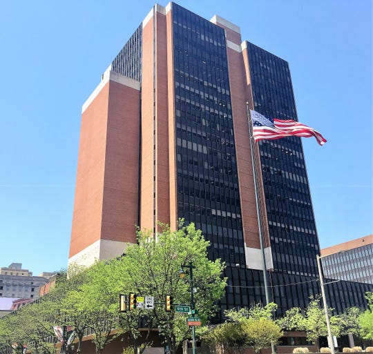 Feds allege woman used multiple schemes to steal from catering firm