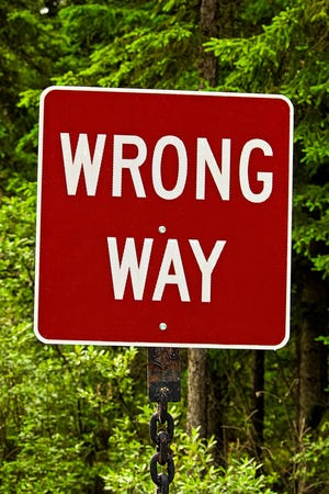 A red wrong way sign