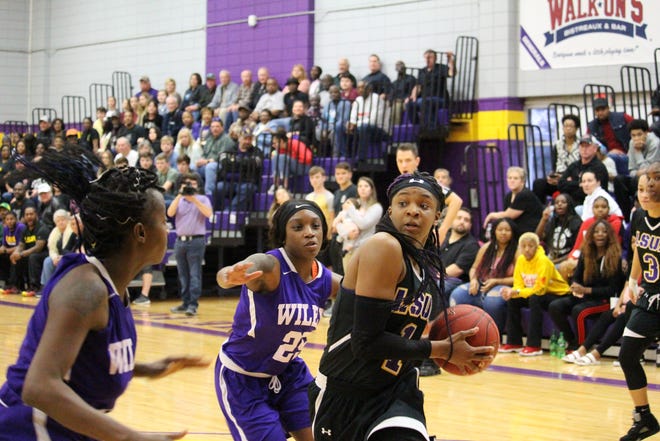 LSUA forward Danyale Bayonne (1) goes up for a shot against Wiley College Saturday.