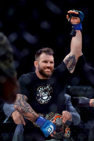 Ryan Bader celebrates his knockout win against Fedora Emelianenko during their mixed martial arts heavyweight world title bout at Bellator 214 on Saturday in Inglewood, Calif.