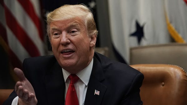 President Donald Trump speaks during a meeting...