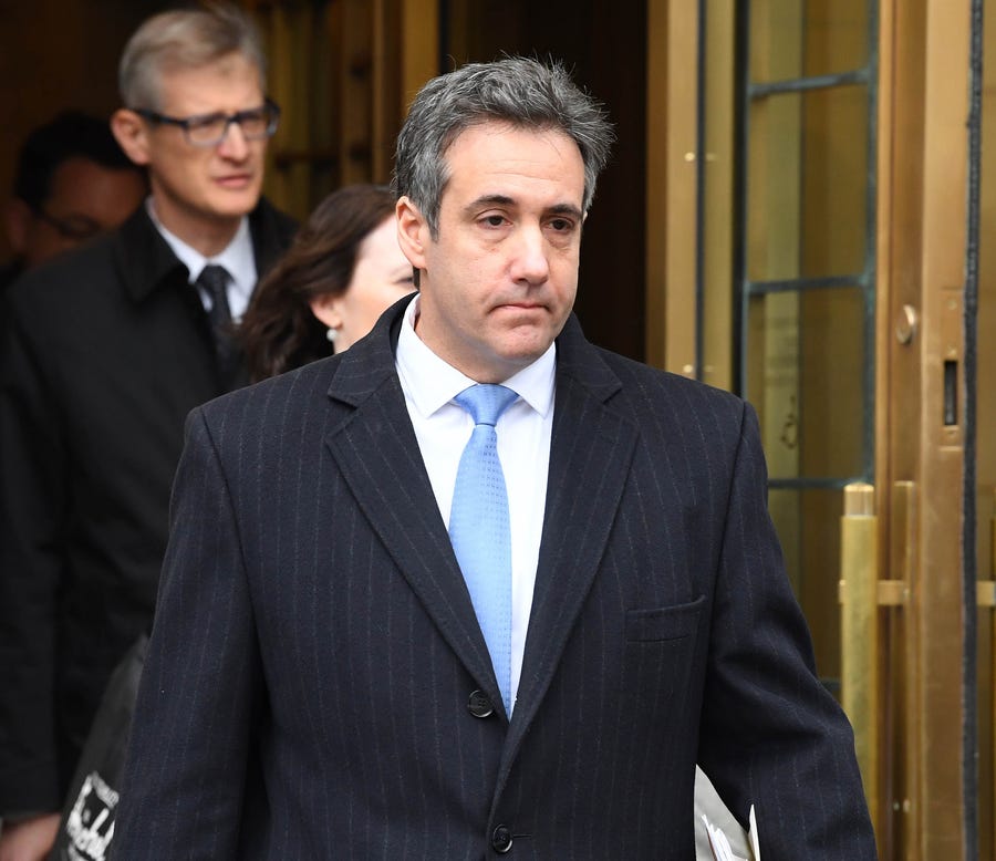 Michael Cohen departs after sentencing at the Moynahan Federal Courthouse in New York on Dec. 12, 2018.