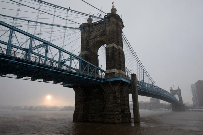 A view of the Roebling Bridge during a winter storm on Wednesday, Jan. 30, 2019, in Downtown Cincinnati. The extreme cold and record-breaking temperatures are moving through Ohio from a storm that pounded Missouri earlier this week. The National Weather Service has issued a wind chill advisory for the Cincinnati Area. The wind chill is currently -17 degrees Fahrenheit. 