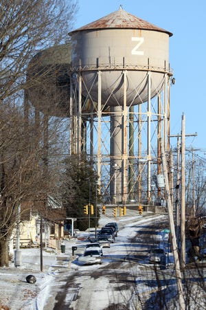After building a new water tower (left) the demolition of the old water tower off Pine Street is part of the city of Zanesville's 2019 plans.
