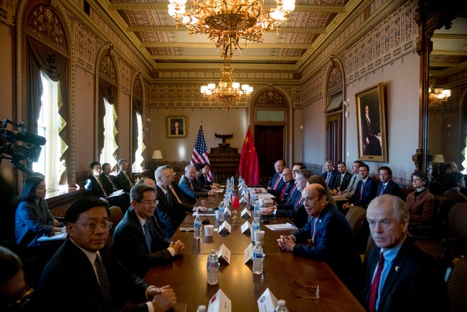 US-China trade talks begin between Trump Administration officials, and Chinese officials in the Diplomatic Room of the Eisenhower Executive Office Building on the White House Complex, Wednesday, Jan. 30, 2019, in Washington.