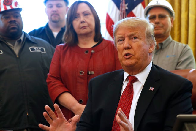 President Donald Trump speaks during a meeting with American manufacturers in the Oval Office of the White House, Thursday, Jan. 31, 2019, in Washington. Trump was signing an executive order pushing those who receive federal funds to "buy American."