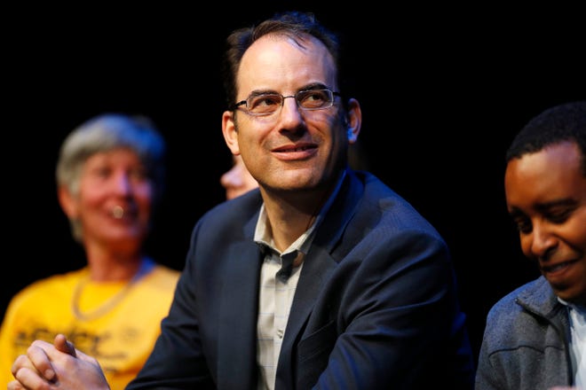 FILE - In this Oct. 26, 2018, file photo, Democratic attorney general candidate Phil Weiser makes a campaign stop in Silverthorne, Colo. On Wednesday, Jan. 30, 2019, Weiser, who is now attorney general, announced that Colorado will withdraw from a lawsuit challenging one of the Obama administration's biggest climate change initiatives and instead will support the plan. Weiser's announcement signaled a reversal from his predecessor, Republican Cynthia Coffman, who signed Colorado onto a multistate lawsuit seeking to roll back the Clean Power Plan. (AP Photo/David Zalubowski,File)