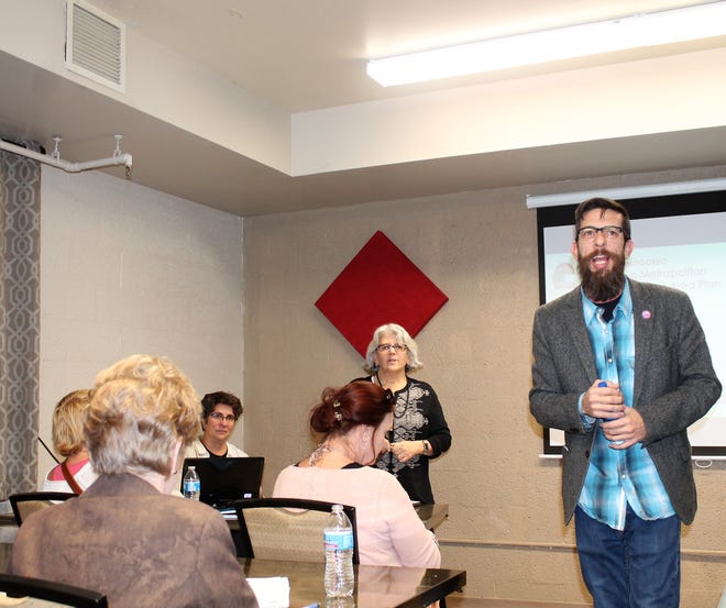 MainStreet Executive Director Cam Wilde  speaks at the draft Downtown Metropolitan Redevelopment Area Plan meeting Jan. 28 at the Sgt. Willie Estrada Civic Center.