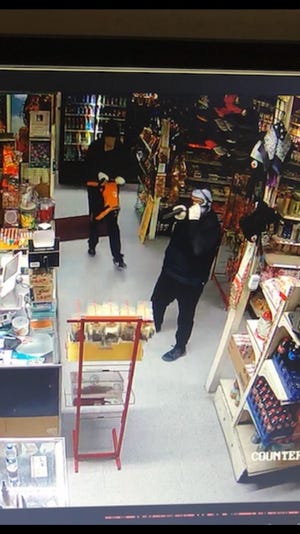 Three  masked men walked into an Ivanhoe grocery store and demanded money. Deputies are asking for the public's help to track the bandits down.