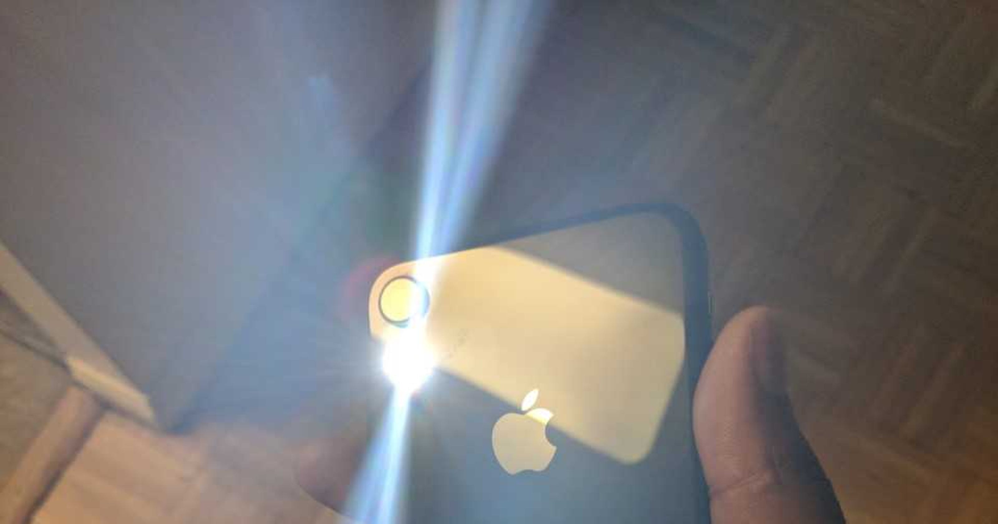 Why iPhone flashlight seems to turn itself on and how to ...