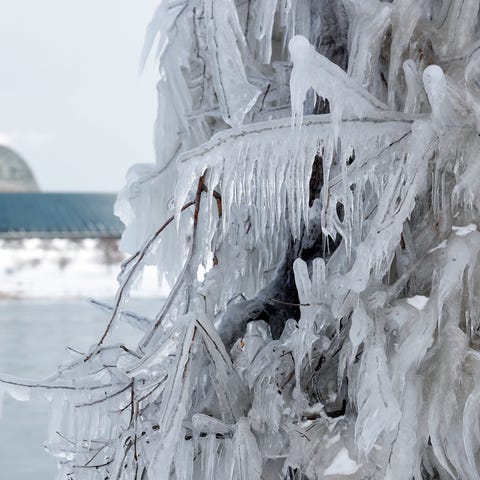 Ice and snow builds up along Lake Michigan in...