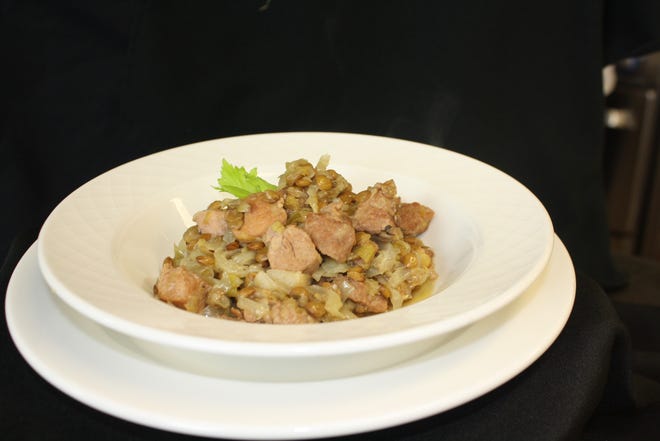 Alsatian Style Lentil, Cabbage and Pork Stew is a hearty dish you can make at home to combat the chill.