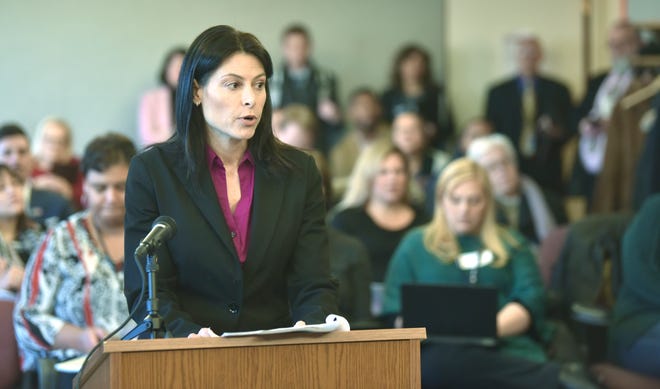 Michigan Attorney General Dana Nessel addresses Michigan Civil Rights commissioners Friday at Cadillac Place in Detroit.
