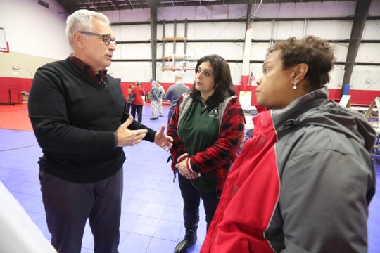Richard Sena, left, speaks with Doris Suarez and Enid Karpeh prior to a joint comprehensive planning meeting at the Haverstraw Community Center in Haverstraw on Wednesday, Jan. 30, 2019.