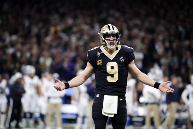 New Orleans Saints quarterback Drew Brees (9) reacts during the fourth quarter of the NFC Championship game at Mercedes-Benz Superdome.