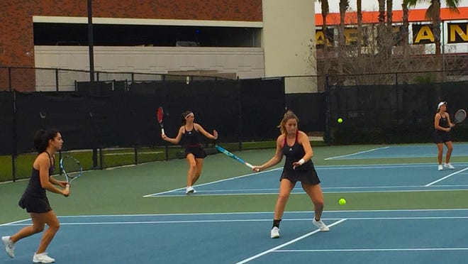 Florida Tech tennis team in action