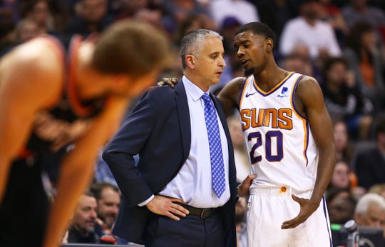 Suns coach Igor Kokoskov talks with forward Josh Jackson during the first half of a game against the Trail Blazers on Jan. 24 at Talking Stick Resort Arena.