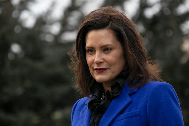 Michigan Governor Gretchen Whitmer, stands in front of the Michigan State Capitol building in Lansing in December, 2018.