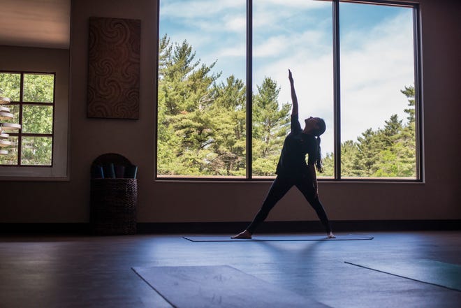 Yoga classes and guided meditation take place in spaces with inspiring views of pine forest at Sundara.