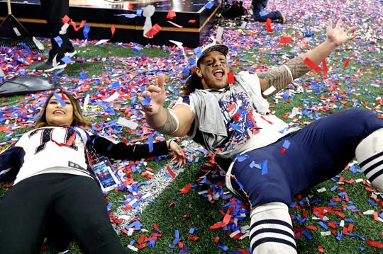 Defensive tackle Danny Shelton (71) celebrates with his wife Mara Shelton after the New England Patriots beat the Los Angeles Rams in Super Bowl LIII.